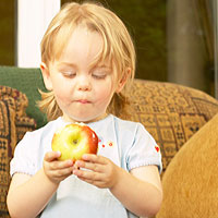 obese-toddler-kid-eating-apple.jpg